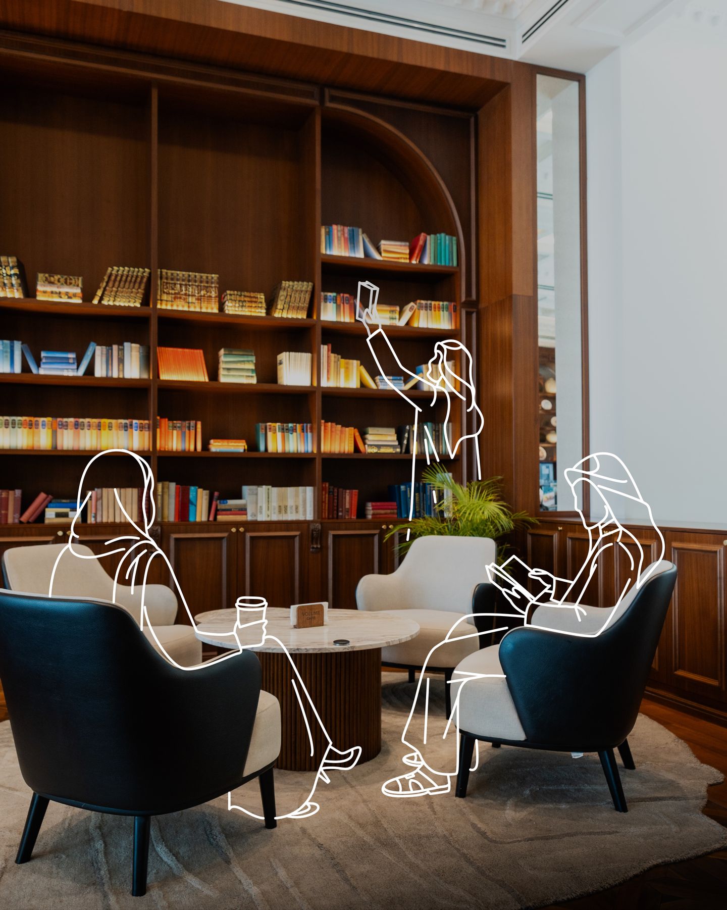 The bookshelves on the upper floor of Volume Cafe